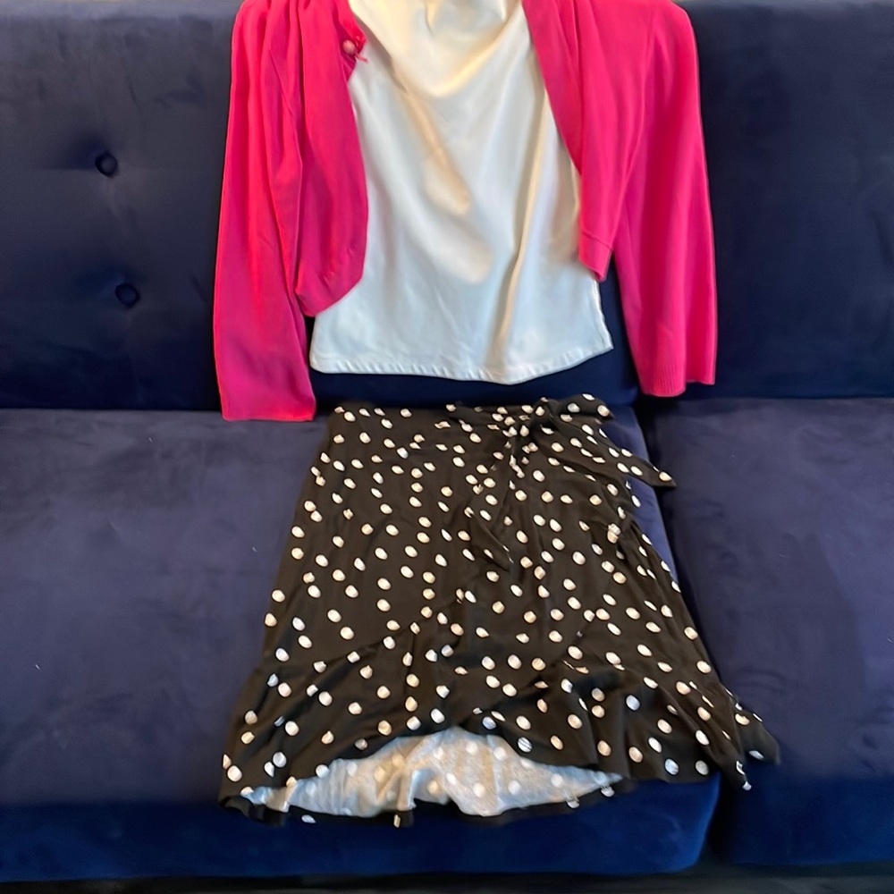 Polka dot skirt with side to bottom ruffle tie
